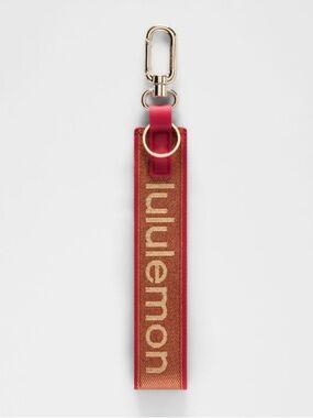 NWT Lululemon Never Lost Keychain Oxford Red Gold Buff lunar new year